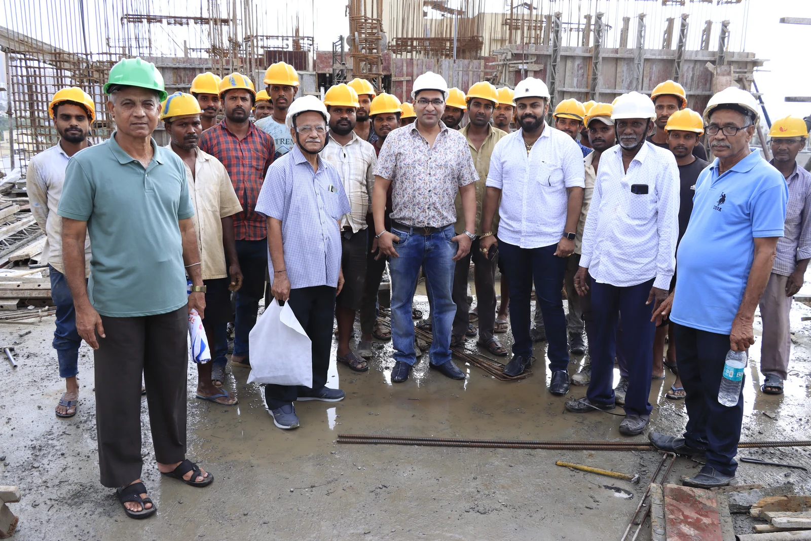 A professional team gathered together during an active site review.
