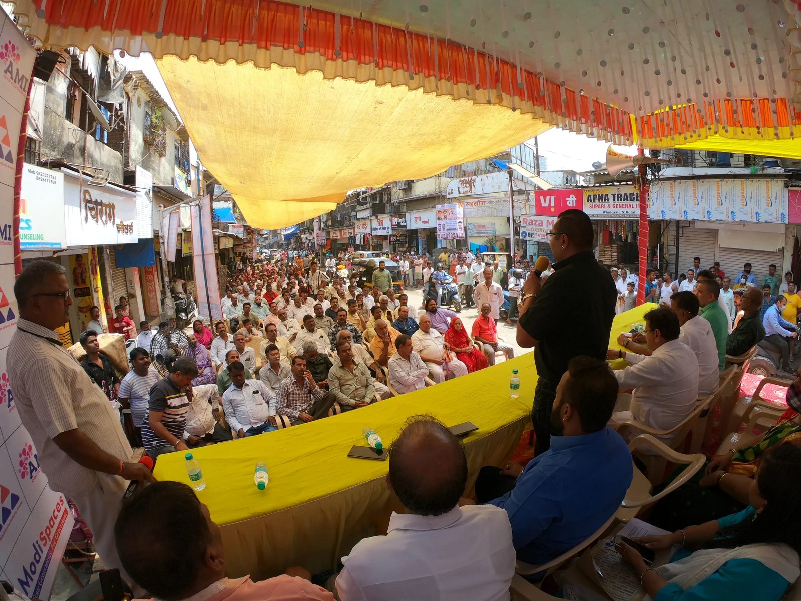 Residents gathered while information and next steps are explained in a public setting.